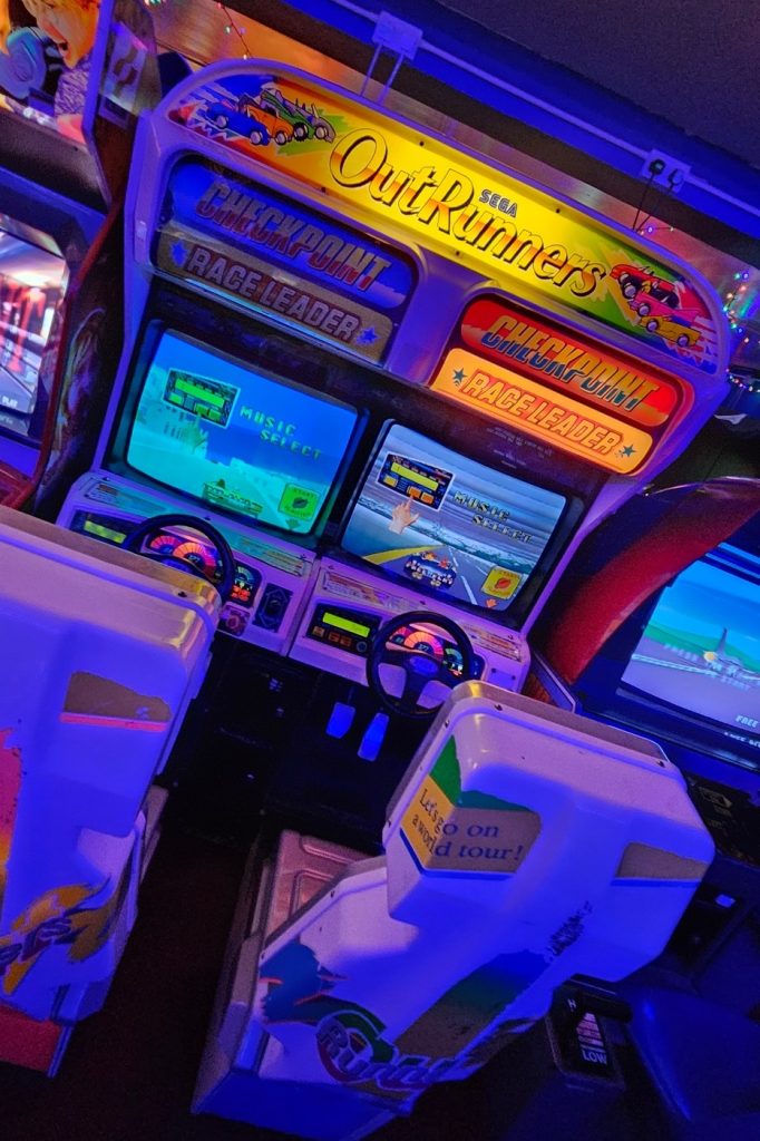 Sega OutRunners twin sit-down racing cabinet