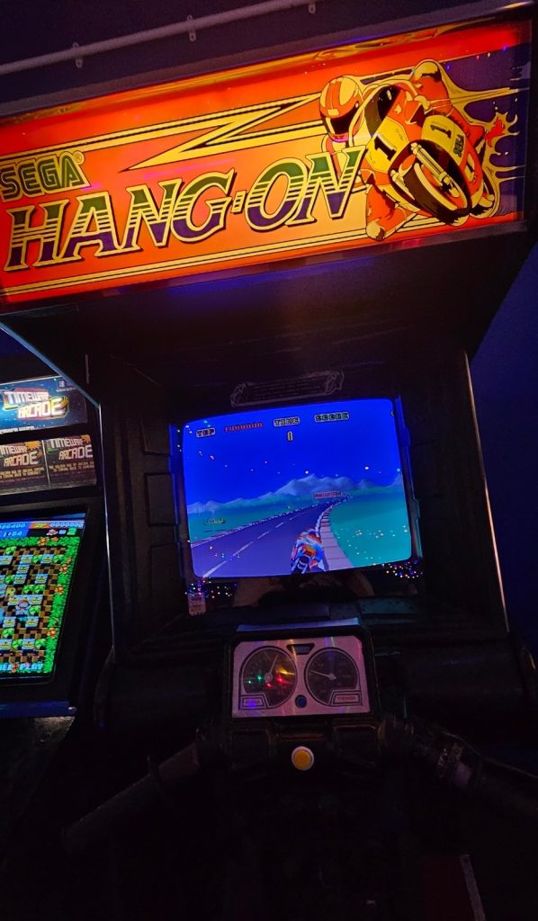 Sega Hang-On cabinet with a Timewarp Arcade sticker